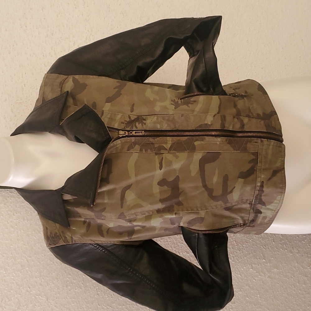 Camouflage and faux leather jacket